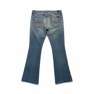 7 For All Mankind A Pocket Low Rise Light Wash Boot Cut Jeans